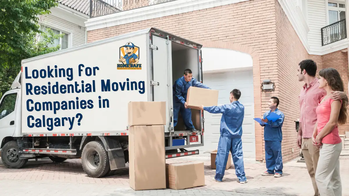 Residential movers loading boxes into a moving truck in Calgary